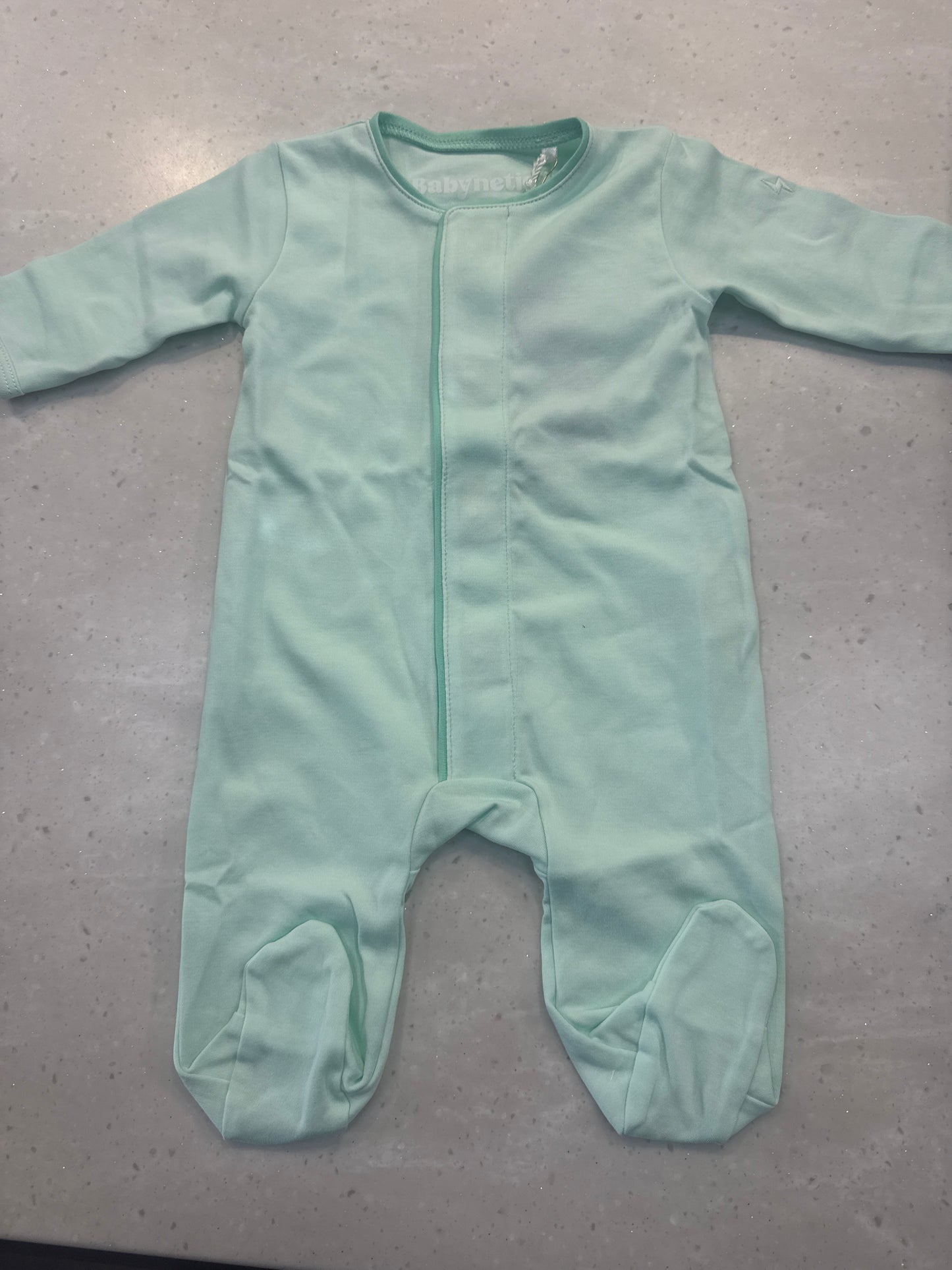 Babynetic Footie in Mint Green with patented magnetic button closure