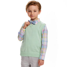 Load image into Gallery viewer, A smirking male child with strawberry blonde hair is wearing a pastel-colored outfit, including a blue and green plaid Bow-tie, a pink plaid button up shirt, and a pastel green sweater vest. He is also wearing light grey chinos.