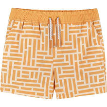 Load image into Gallery viewer, Light orange swim trunks, with an orange and white geometric pattern, against a plain white backdrop.