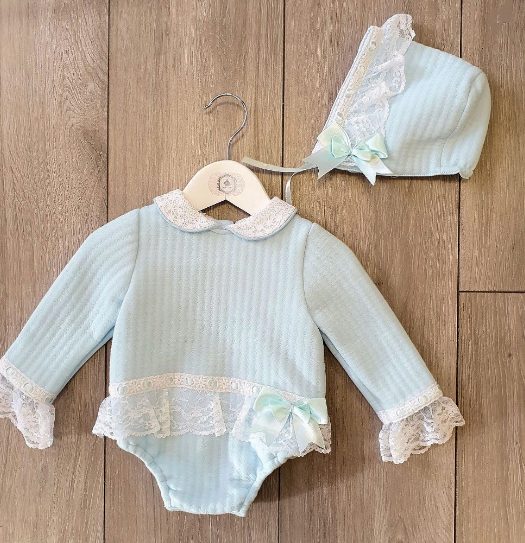 Beau Kid Blue Romper & Hat set in 100% cotton, displayed flat on neutral background