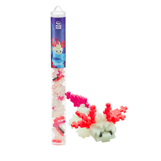 Plus-Plus Axolotl tube with 70 glow-in-the-dark pieces in Glow, Navy, Coral, and Fuchsia