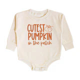Sweet Wink Cutest Pumpkin bodysuit in cream with orange chenille pumpkin appliqué
