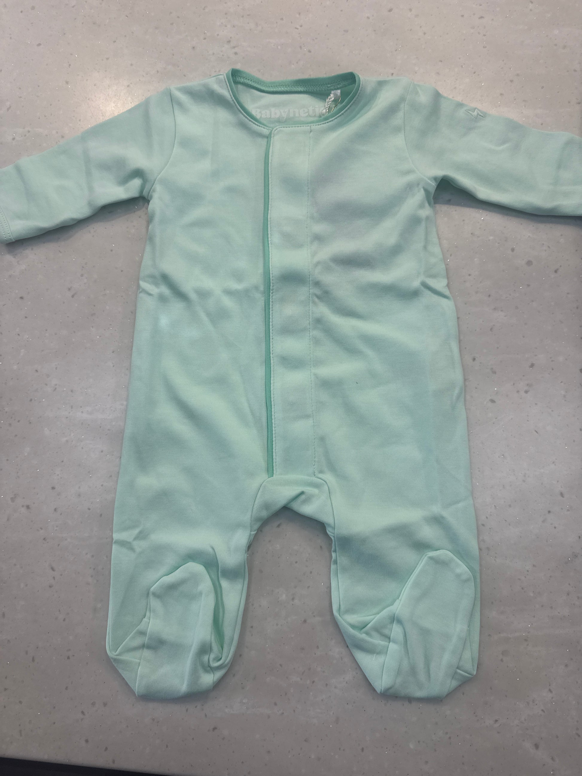 Babynetic Footie in Mint Green with patented magnetic button closure