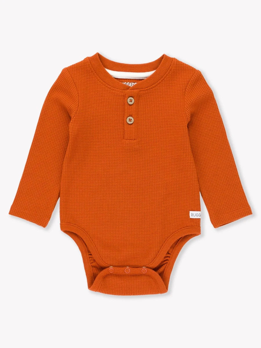 Waffle knit henley bodysuit in rust with button placket detail by Rugged Butts