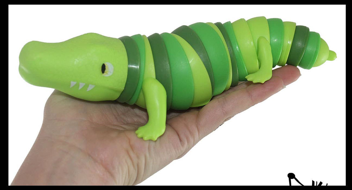 Alligator Wiggle fidget toy with segmented hard plastic body, 8 inches long, in varied colored cups