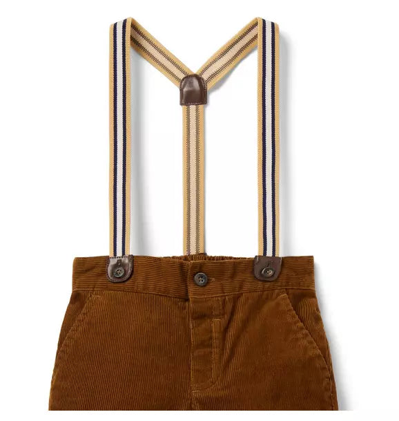 Brown corduroy pant with attached striped suspenders and faux leather details, button front, back pockets