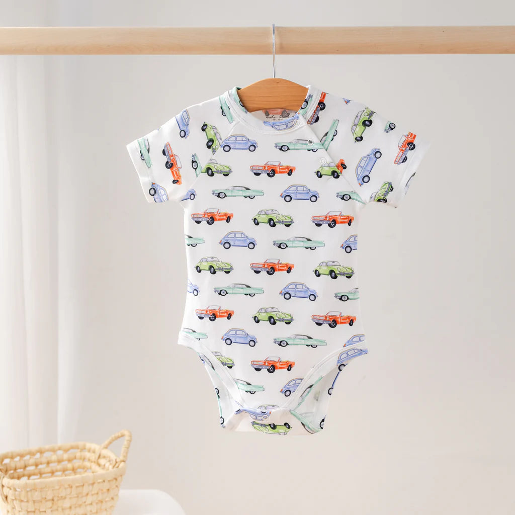 Nola Tawk organic cotton onesie with shoulder and bottom snaps, snug fit