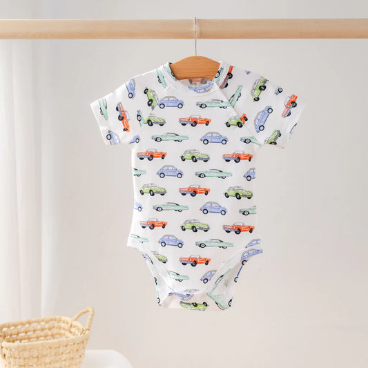 Nola Tawk organic cotton onesie with shoulder and bottom snaps, snug fit