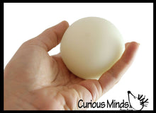 Load image into Gallery viewer, Curious Minds Toys - Glow Nee Doh Soft Fluff- Filled Squeeze Stress Ball
