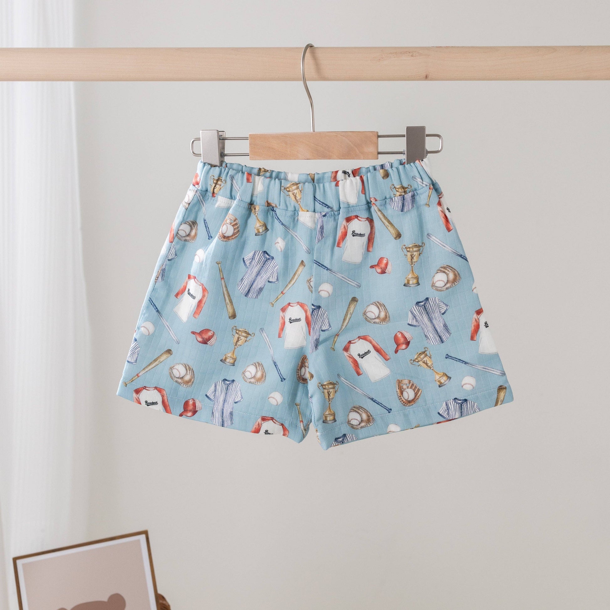 Let's Play Ball Organic Muslin Shorts in natural with baseball-inspired print by Nola Tawk