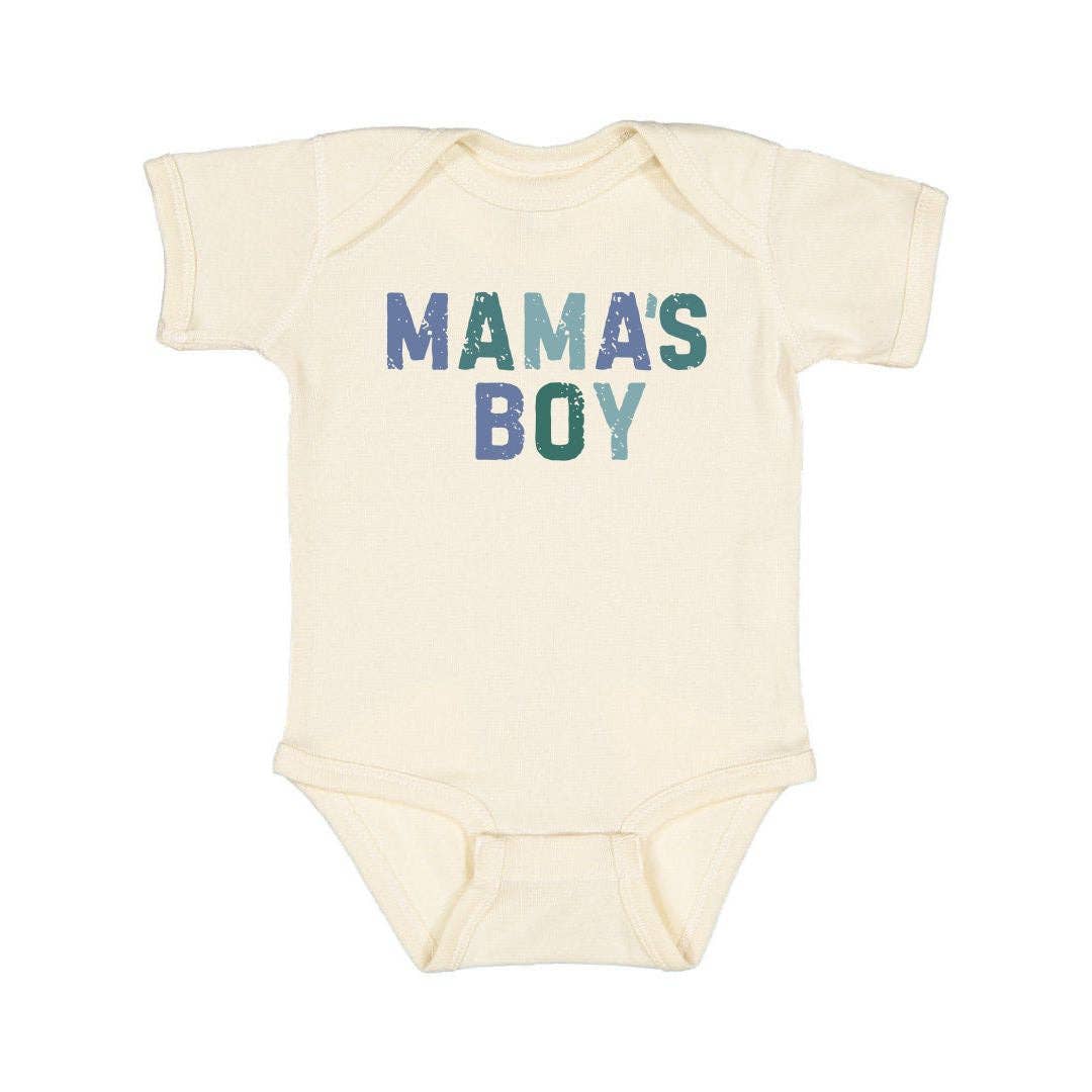 Sweet Wink Mama's Boy Multi Short Sleeve Bodysuit in natural with indigo, steel blue, and teal graphic