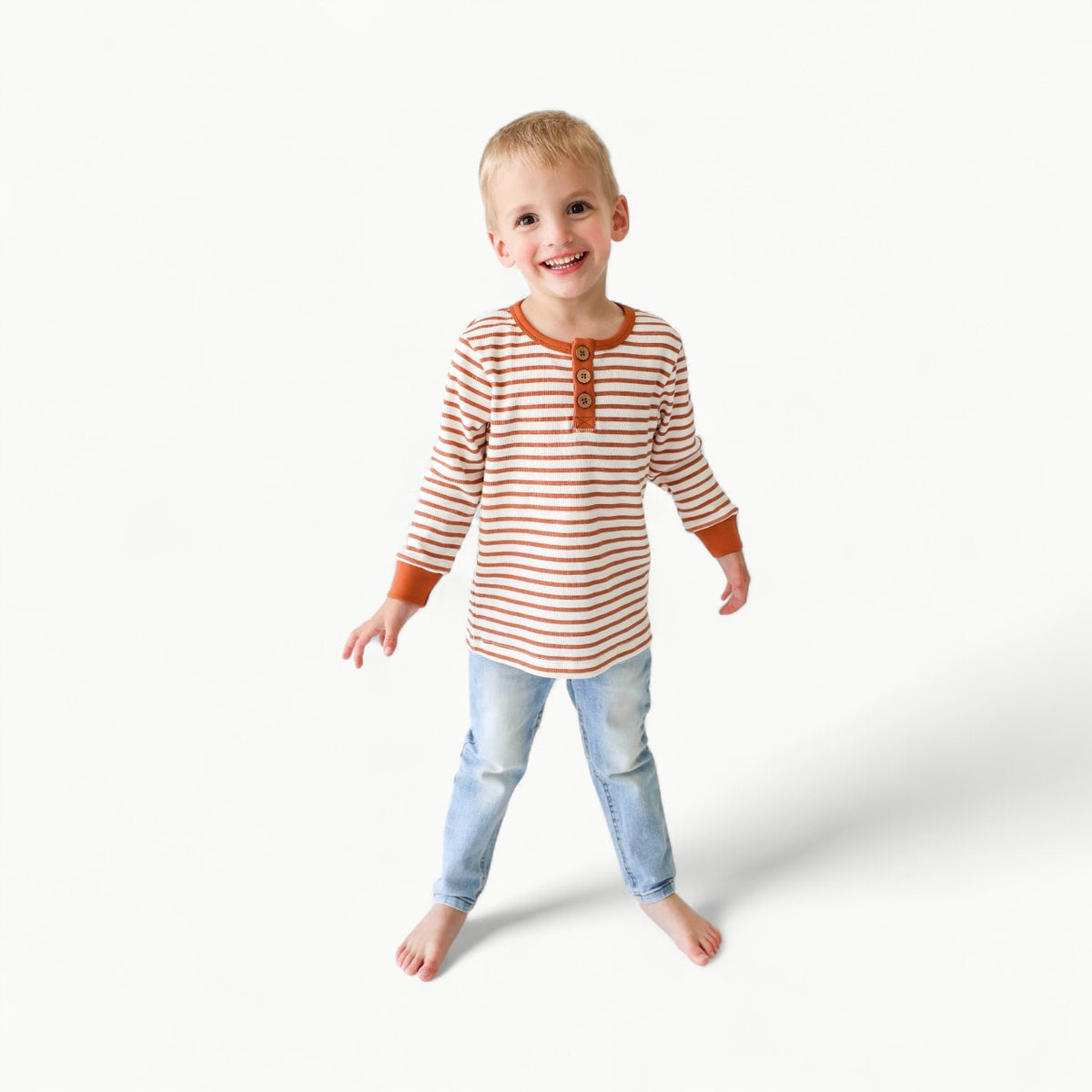 Terracotta striped boys' long sleeve henley with wooden button placket and contrast collar trim