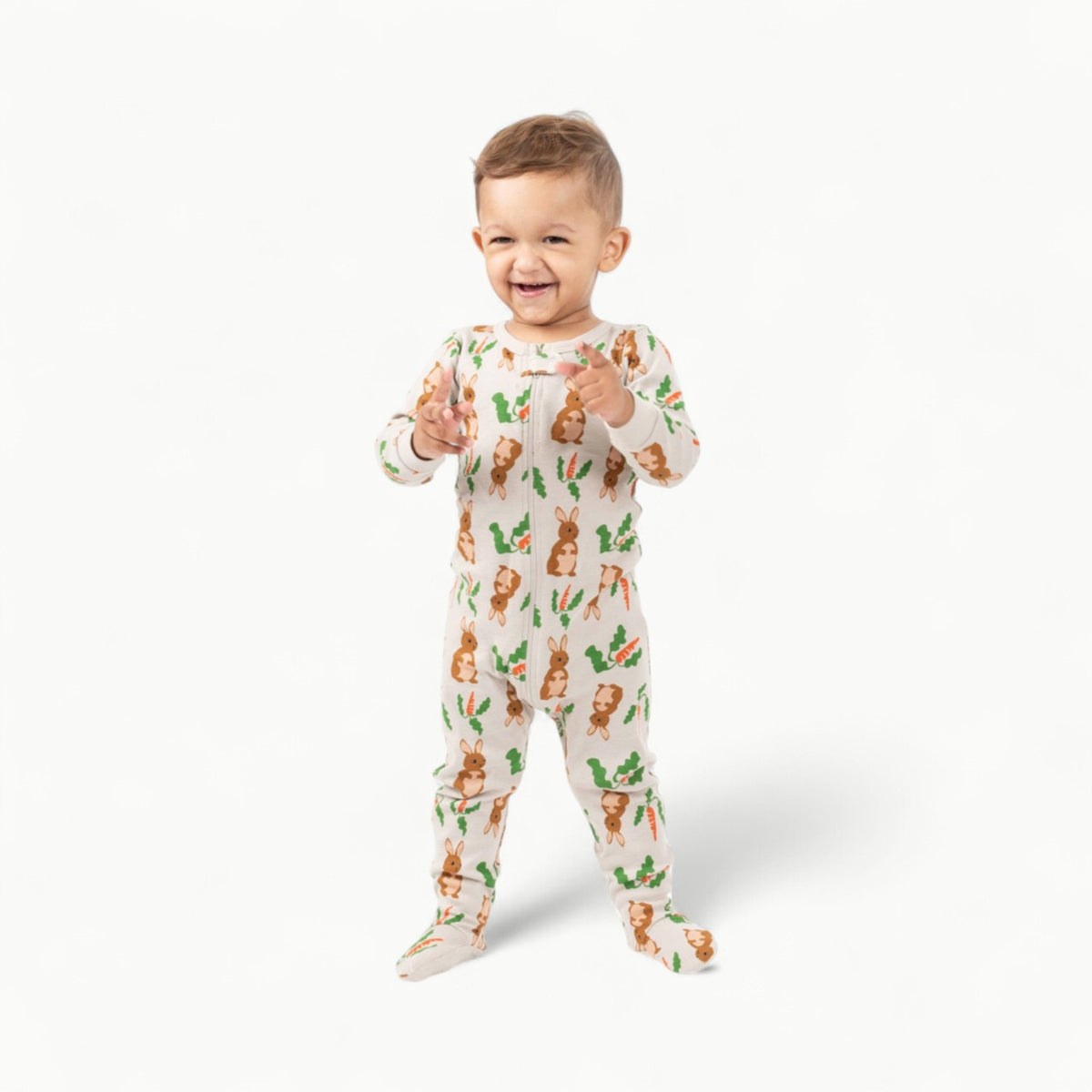 Baby footed bunny pajamas in colorful Easter pattern with long sleeves and zip-up closure
