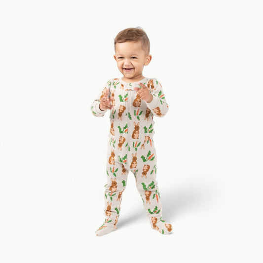 Baby footed bunny pajamas in colorful Easter pattern with long sleeves and zip-up closure