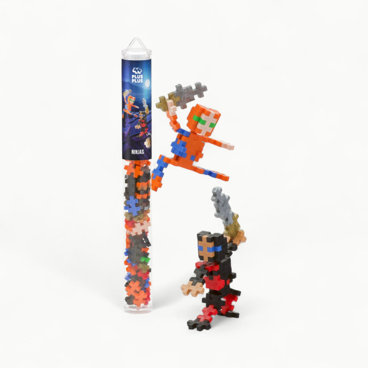 Plus-Plus Ninjas 70-piece building set in reusable tube with black, brown, red, and gold interlocking pieces