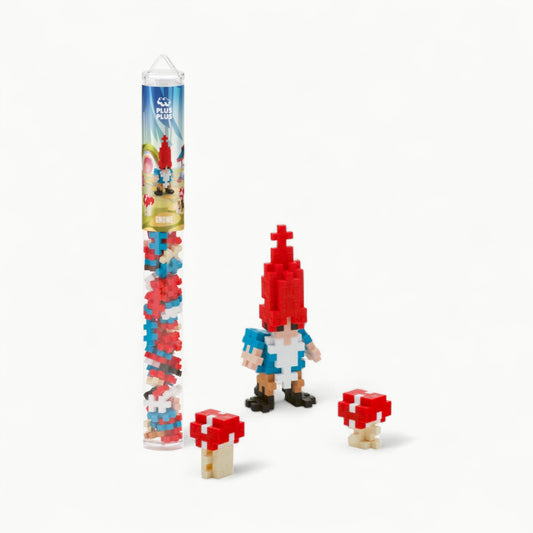Plus-Plus Gnome tube activity toy with 70 interlocking plastic pieces in eight colors and instruction flyer