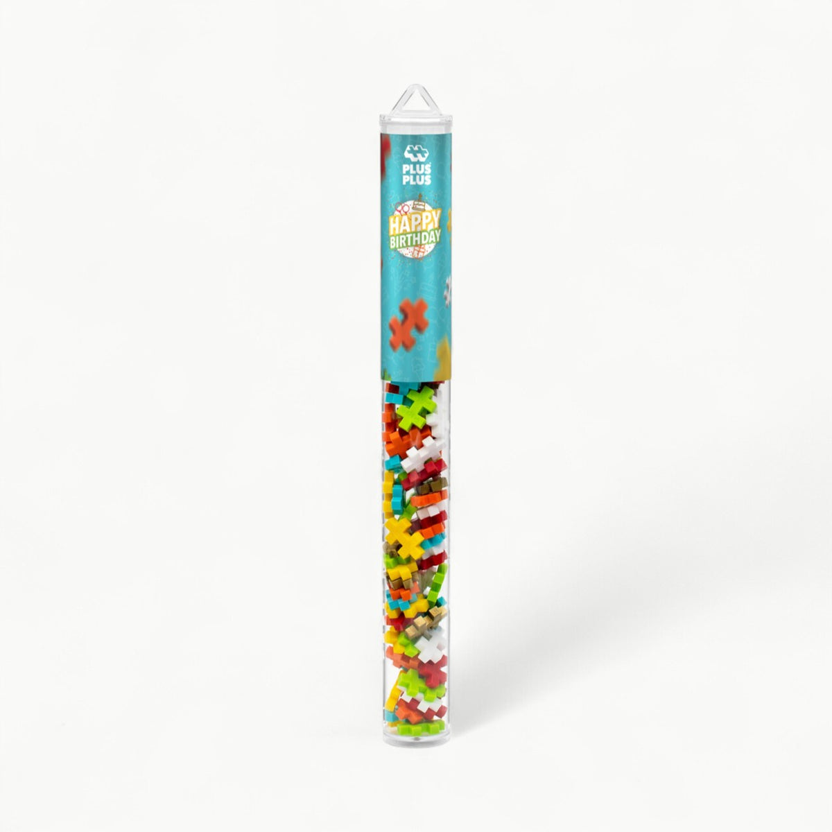Plus-Plus Happy Birthday tube with 70 interlocking pieces in seven colors arranged on white background