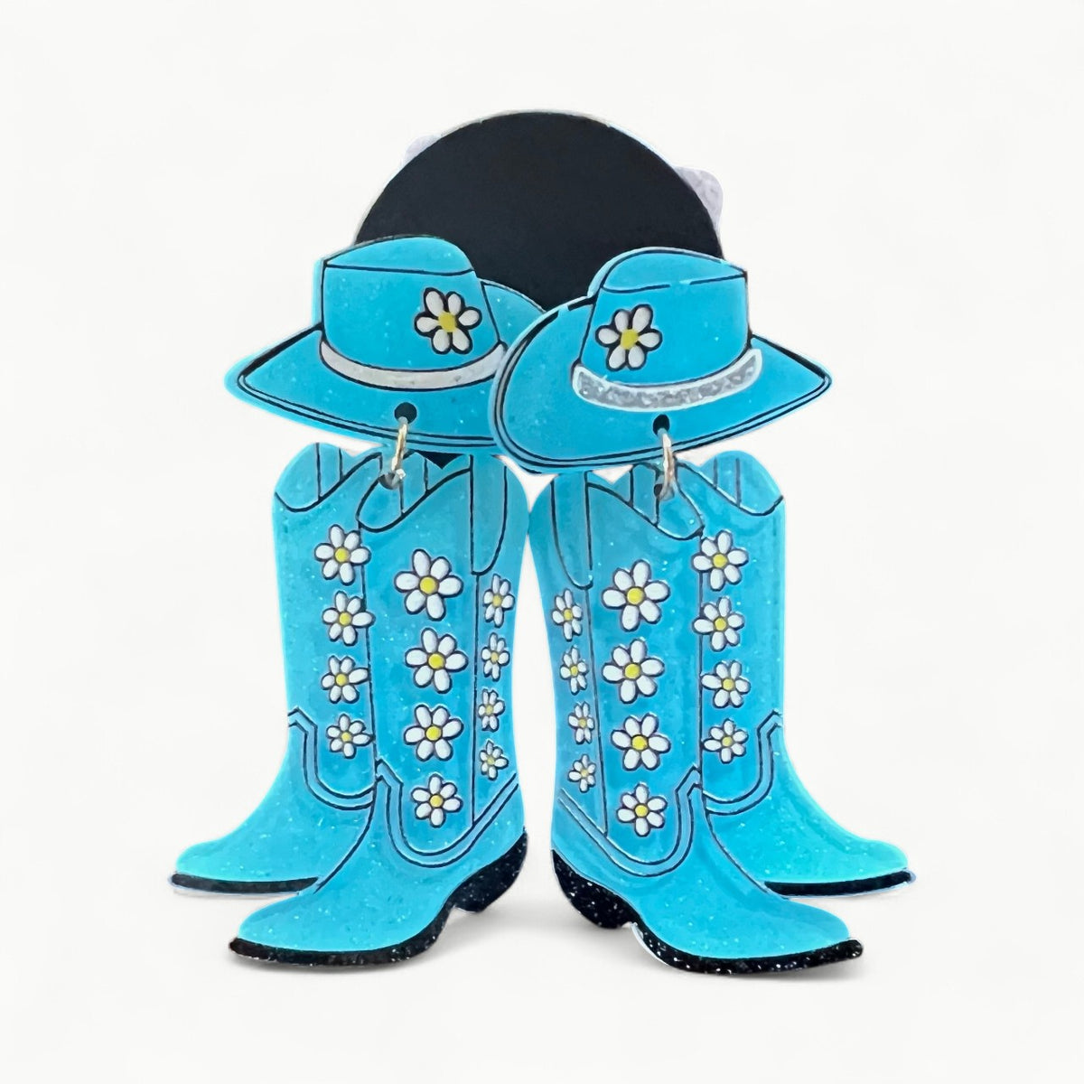 Light blue Viola post earrings with dangling boot and hat charms, daisy print detail