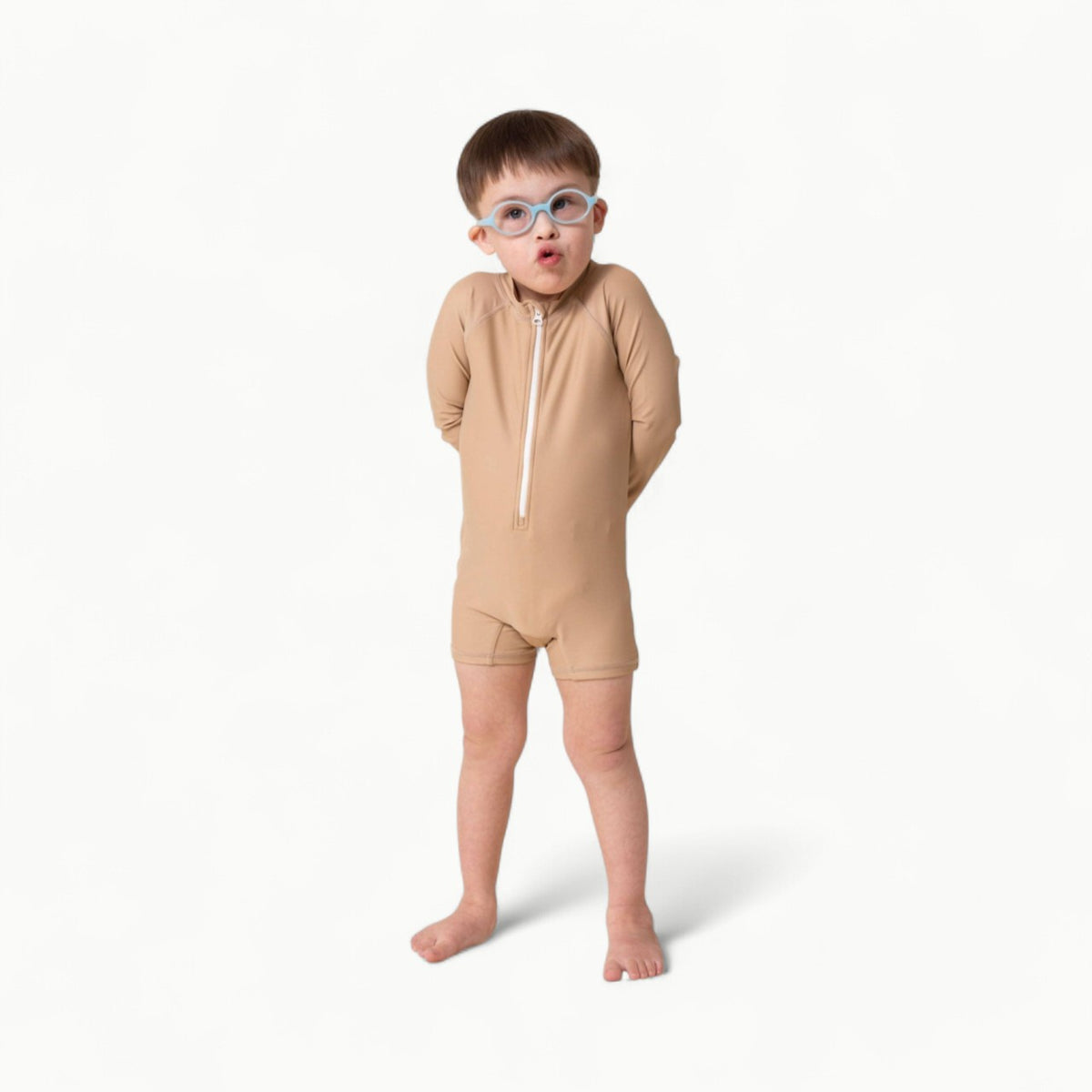 Brown and white boy's zip-up rashguard with UPF 50+ protection by Roco Swim