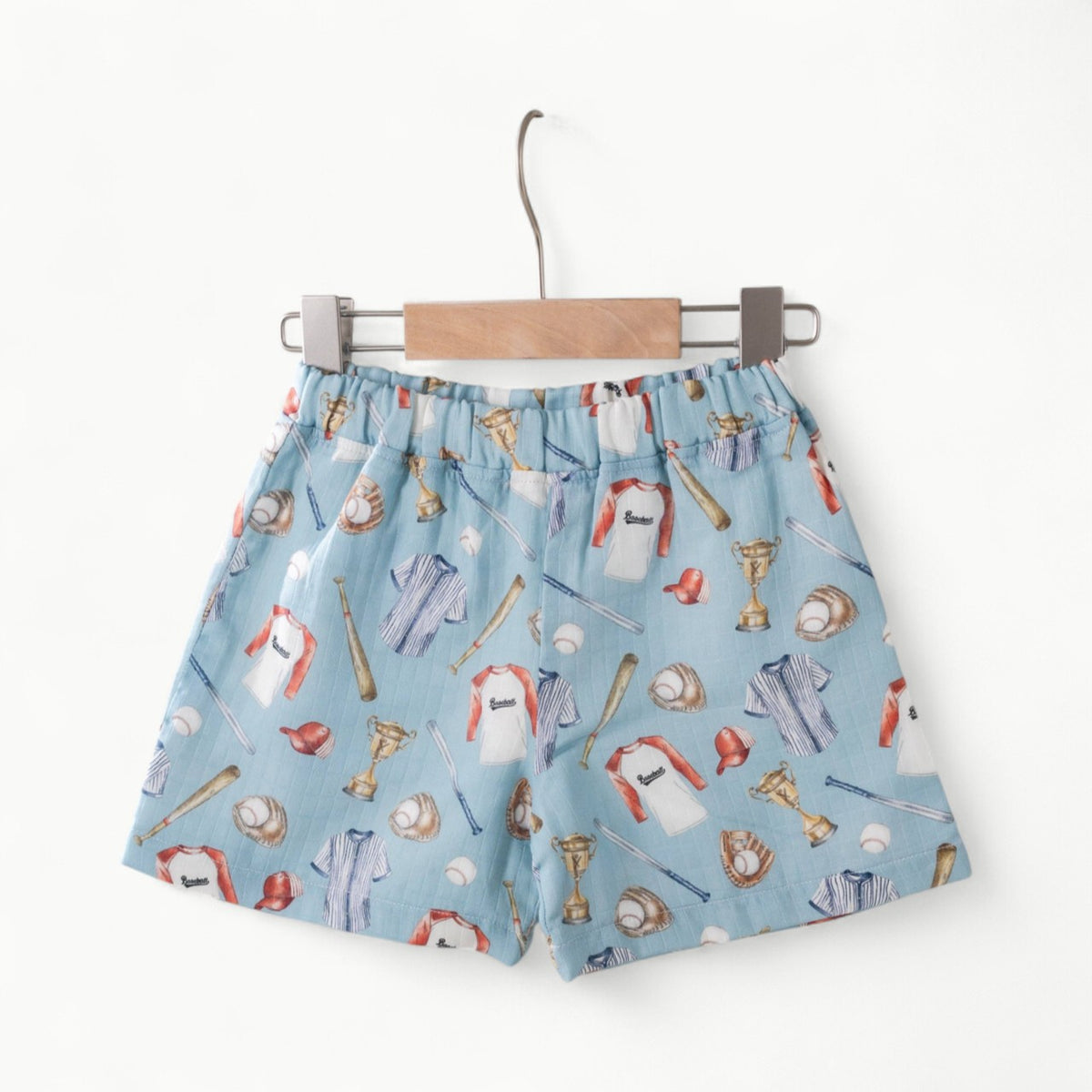 Let's Play Ball Organic Muslin Shorts in natural with baseball-inspired print by Nola Tawk
