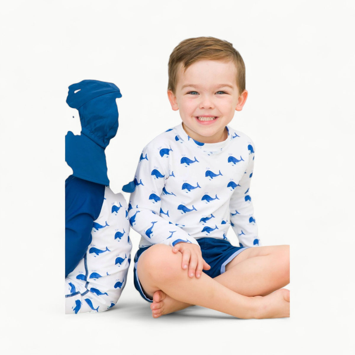 Boys long sleeve whale print rash guard with UPF 50+ sun protection