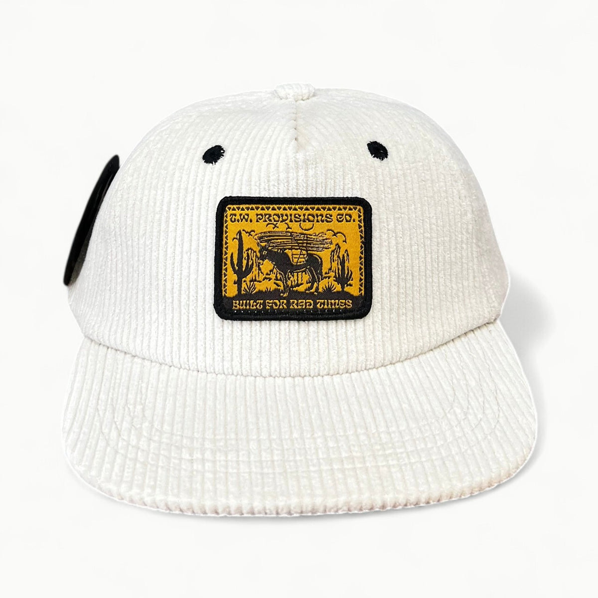 Cream corduroy trucker hat with embroidered T.W. Provisions Co. patch and mesh back panels