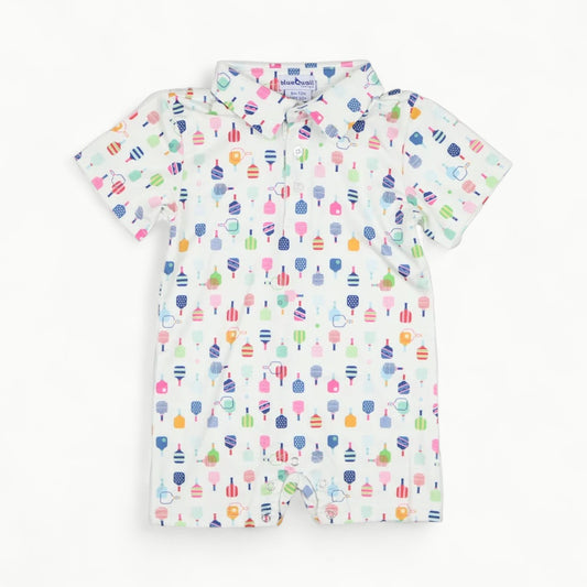 Blue Quail Pickleball Polo short-sleeve romper in refined blue, featuring mesh venting and tailored polo silhouette