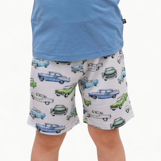 Elvis Terry Shorts in soft grey with hand-illustrated chrome fins and vintage cars, by Lev Baby