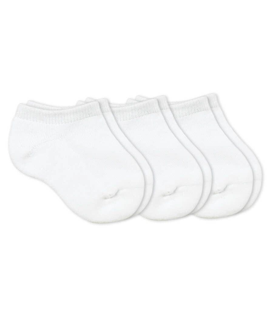 3 pairs of plain white ankle socks against a plain white backdrop. Th socks are made for a toddler.