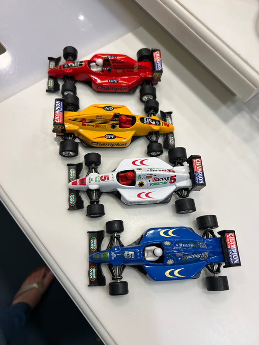 Formula One pullback car by Daron Worldwide Trading; refined motorsport-inspired activity toy
