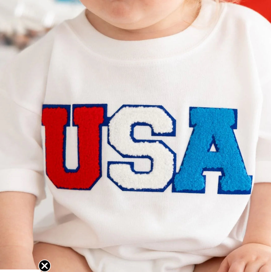 White USA Patch Romper by Sweet Wink, featuring subtle patch detail