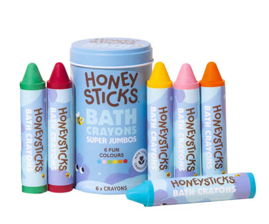 Set of six colorful Honeysticks Super Jumbo Bath Crayons in yellow, red, white, blue, and indigo