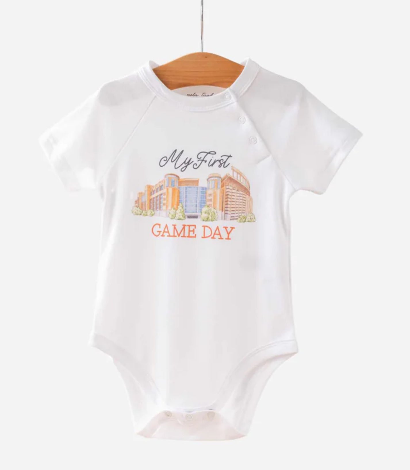 GOTS-certified organic cotton Football Onesie by Nola Tawk with snap closures