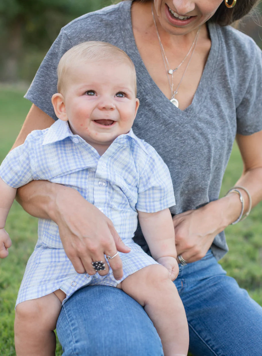 Blue Quail guayabera-style short-sleeve romper in blue plaid linen