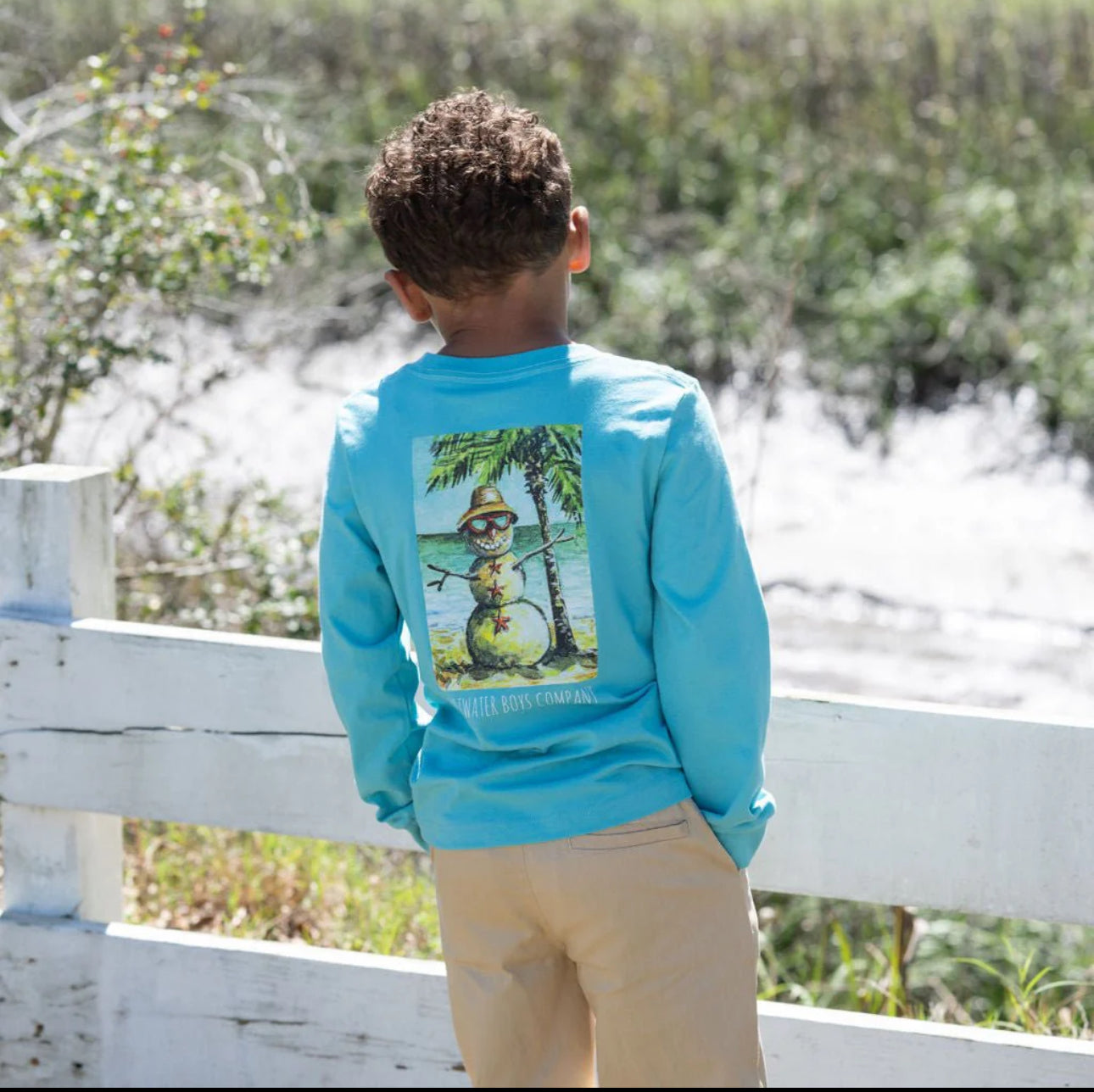 Mr Sandman long-sleeve tee in aqua with tropical sand snowman graphic pocket detail