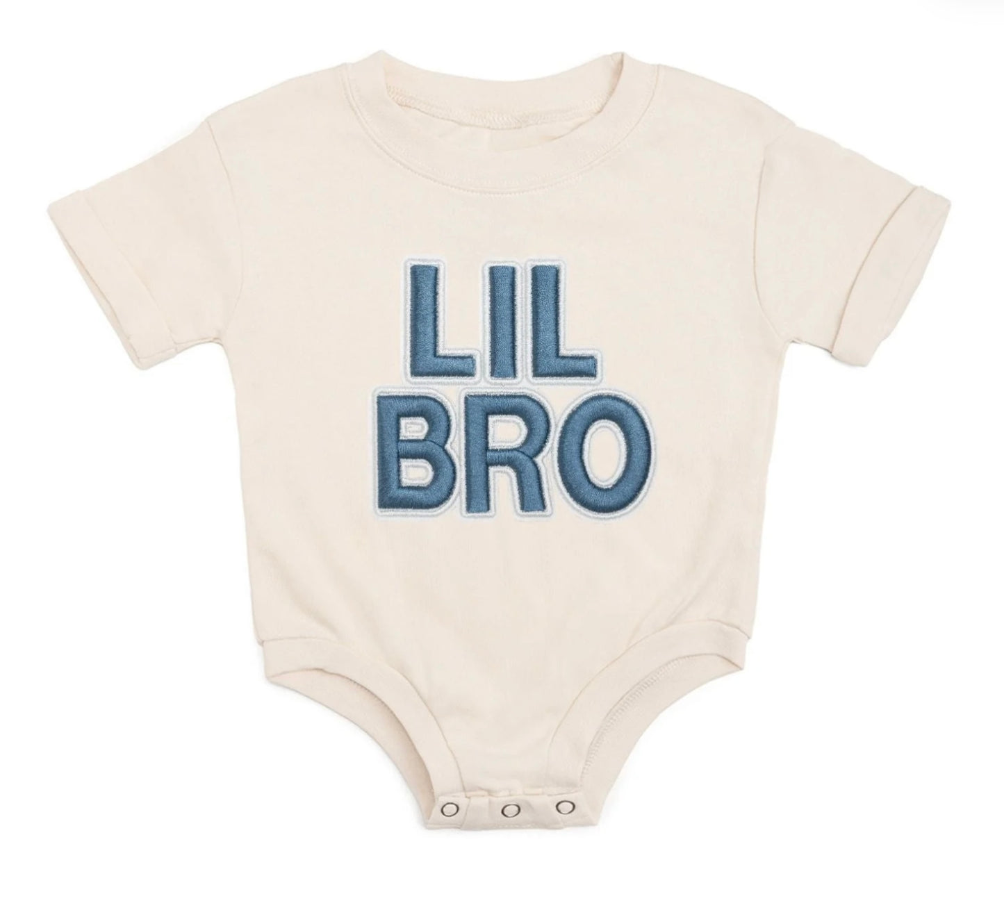 Natural cotton romper with blue embroidered 'Lil Bro' patch, bubble sleeves, tagless design