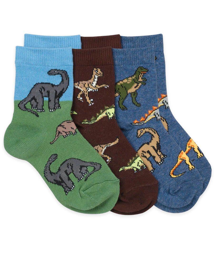 Brown Jefferies dinosaur crew socks with assorted prehistoric pattern and stay-up rib top