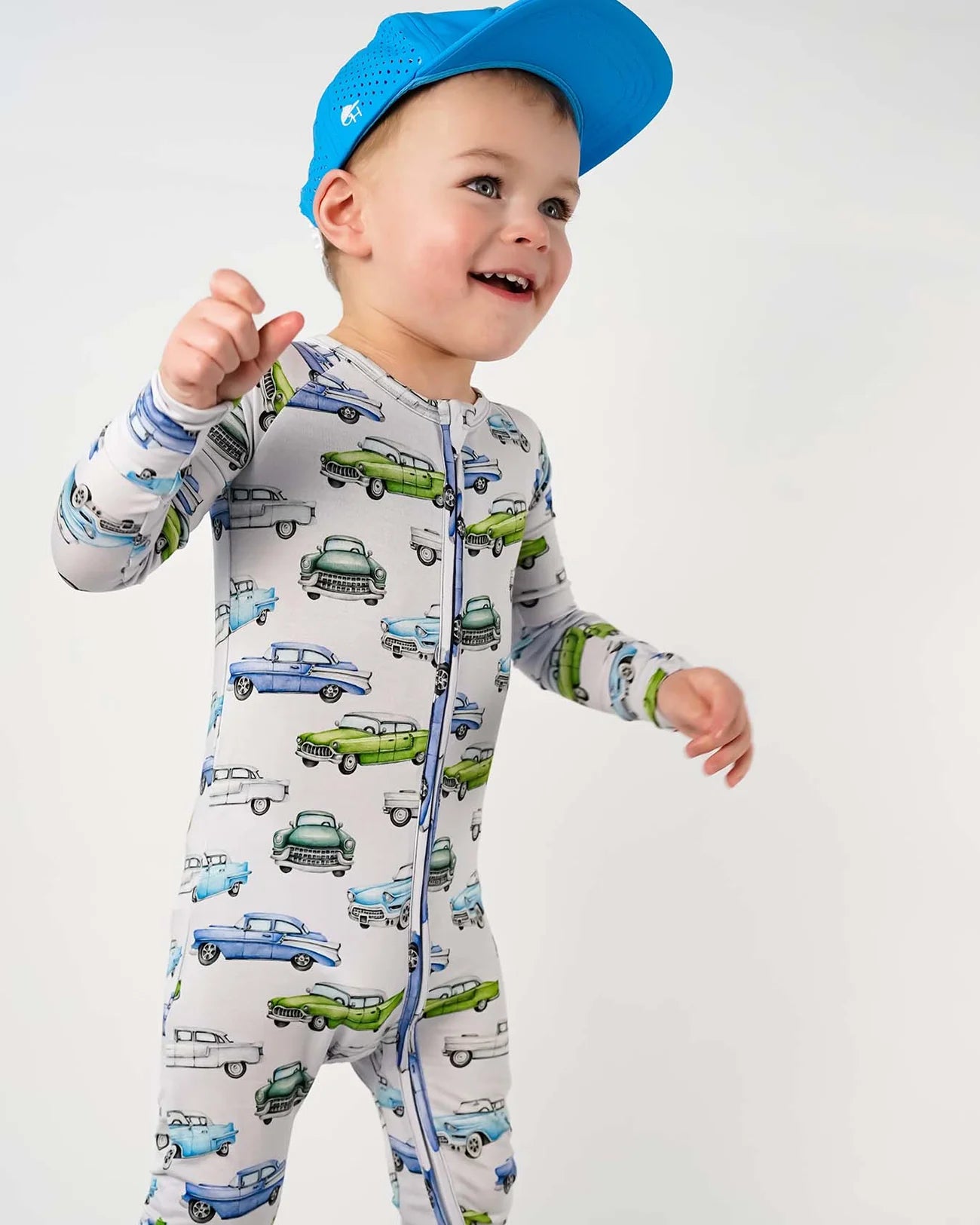 Elvis Poppy convertible romper in soft grey with vintage chrome fins and cool blue print by Lev Baby