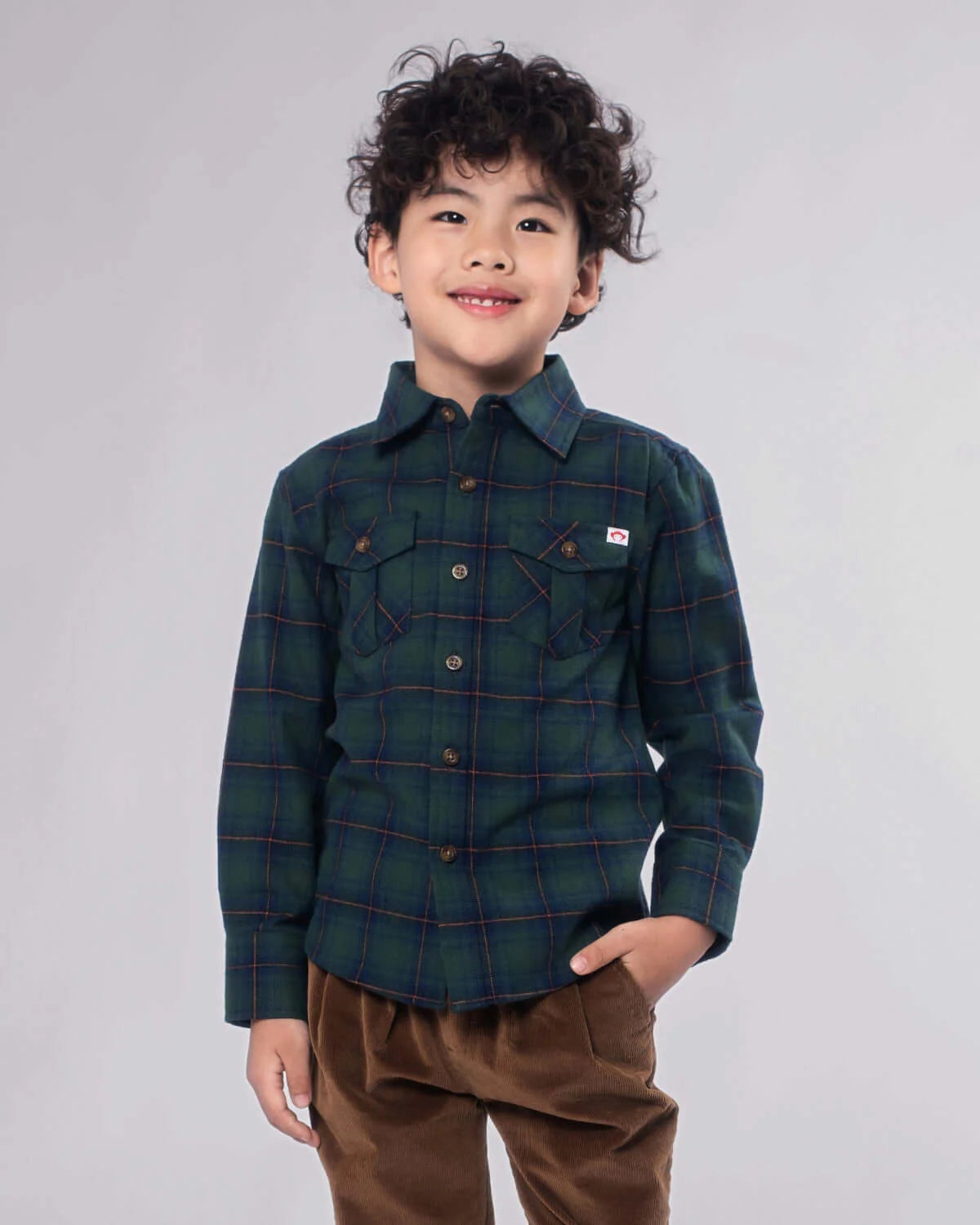Blue-green plaid flannel button-up shirt by Appaman with chest pocket and classic collar