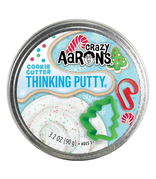Cookie Cutter Thinking Putty in green and red glitter with two stainless steel cookie cutters