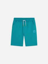 Load image into Gallery viewer, Core Logo Badge Regular fit Sweatshorts in Tahitian Teal
