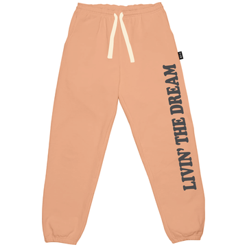 Livin The Dream Sweatpants in Coral with tiny whales print by Tiny Whales