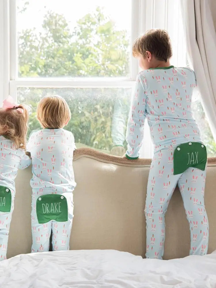 Easter Bunny Pajamas by Sugar Bee Clothing in cream with contrasting buttflap detail