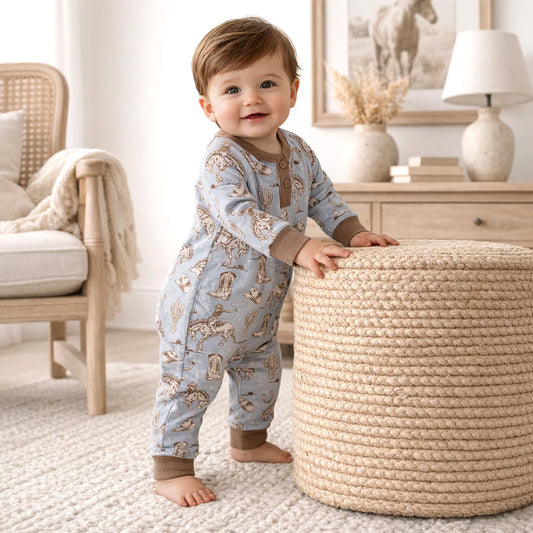 Wild Wrangler blue Henley long-sleeve romper with cowboy print and wooden buttons by Tesa Babe