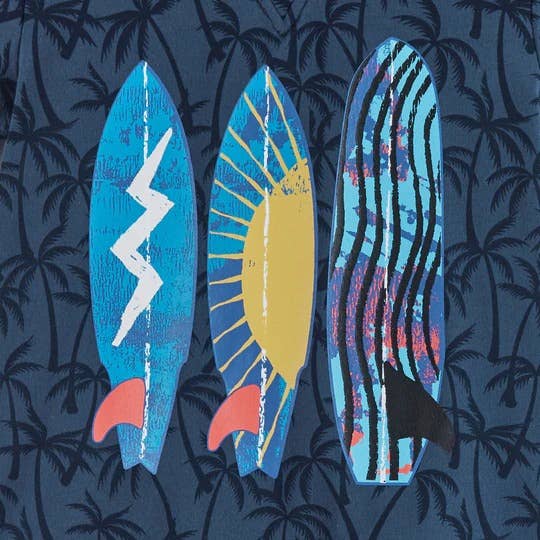 Three brightly colored surfboards against a Navy blue pattern with dark navy palm trees.