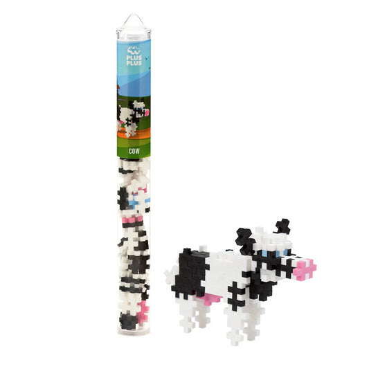 Plus-Plus Cow tube with 70 pastel and neutral building blocks in reusable travel container
