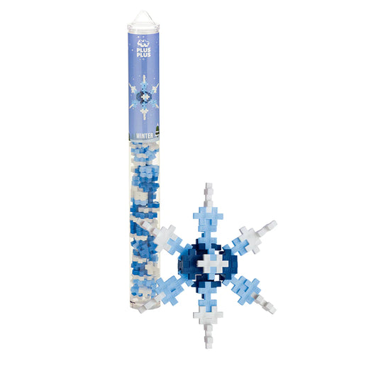 Plus-Plus Winter Mix tube with 70 interlocking building pieces in white, blue, and pastel blue.