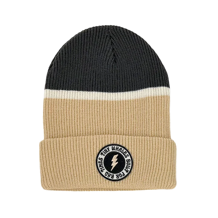 High Voltage Beanie by Tiny Whales in sand and faded black chunky knit with embroidered patch