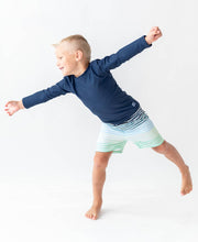 Load image into Gallery viewer, RuffleButts + RuggedButts - Boys Navy Long Sleeve Rash Guard
