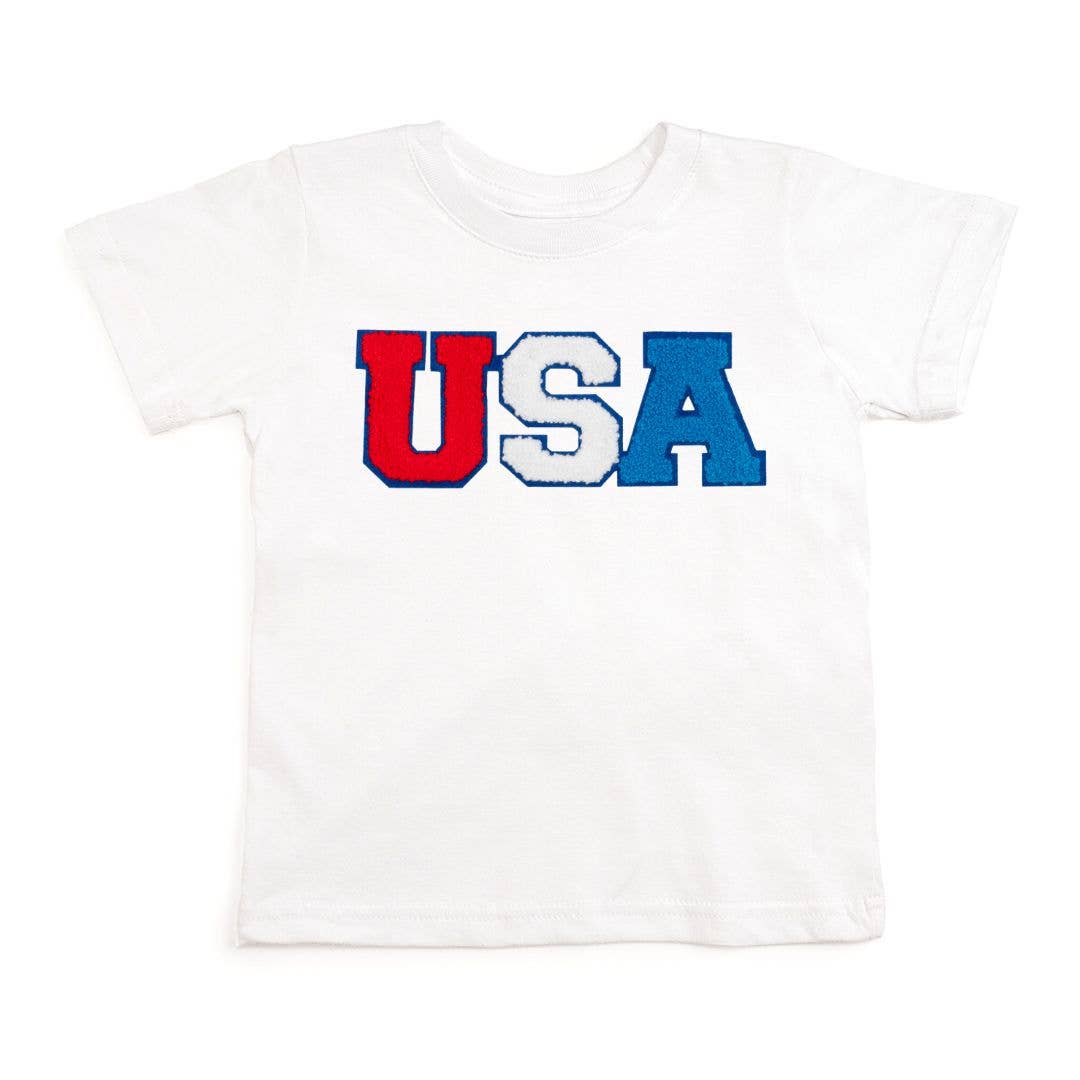 White short-sleeve tee with red, white, and blue chenille USA patch and blue felt outline